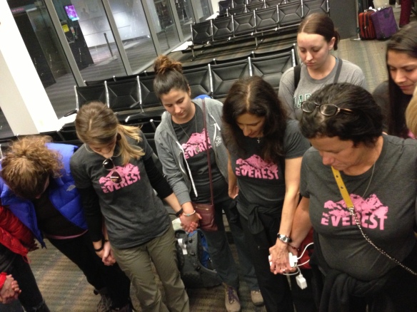 Members of the Freedom Climb Team Pray for their journey during their layover in Washington, D.C.